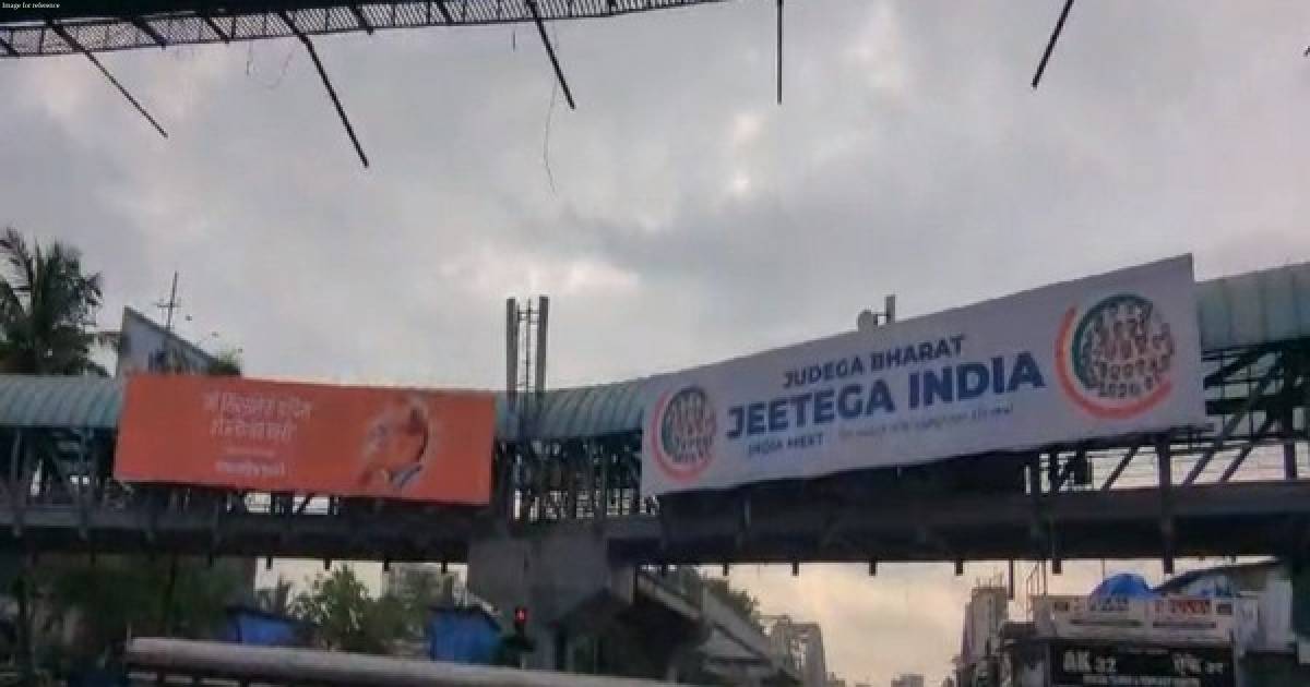 “Will not let Shiv Sena become Congress”: Banner inscribed with Balasaheb’s old remark go up alongside INDIA’s in Mumbai
